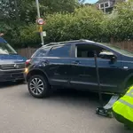 Mobile tyre fitter working on a car tyre in London & the South East